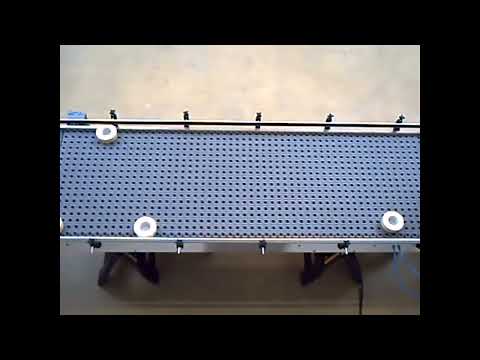 Divergeur à galets orientés pour les produits à fond plat_1