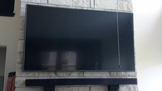 How to mount a TV in brick or stone over your mantle