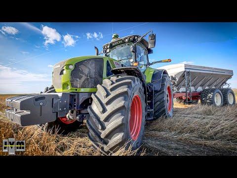 JVM Farms Canada -  Claas Axion 920 with Salford BBI Magnaspread spreading fertilizer. BIG FIELDS