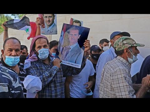 شاهد لاجئون سوريون يدلون بأصواتهم للانتخابات الرئاسية في سفارة بلادهم في لبنان…