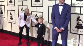 Justin Bieber and Jaxon Bieber arrive at the 58th GRAMMY Awards in Los Angeles