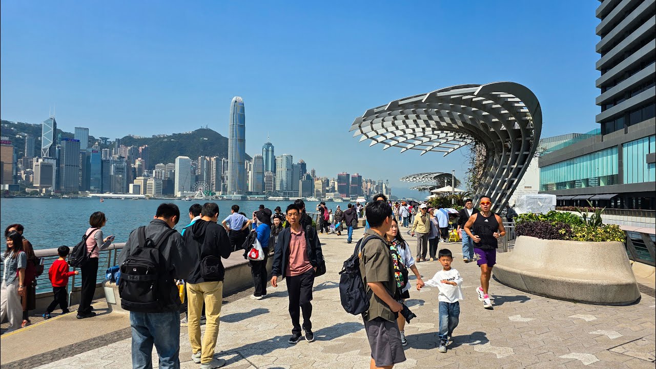 Watch the statues and displays celebrating Hong Kong cinema on the waterfront