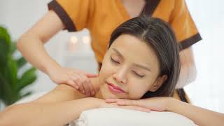 Asian young woman feeling happy and relax during Massage
