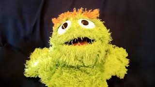 Oscar the grouch sings I heard my dog bark