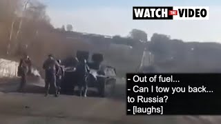 Ukrainian taunts Russian soldiers in broken down tank