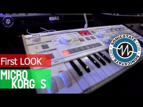 Korg MicroKorg S in White and larger than life speakers