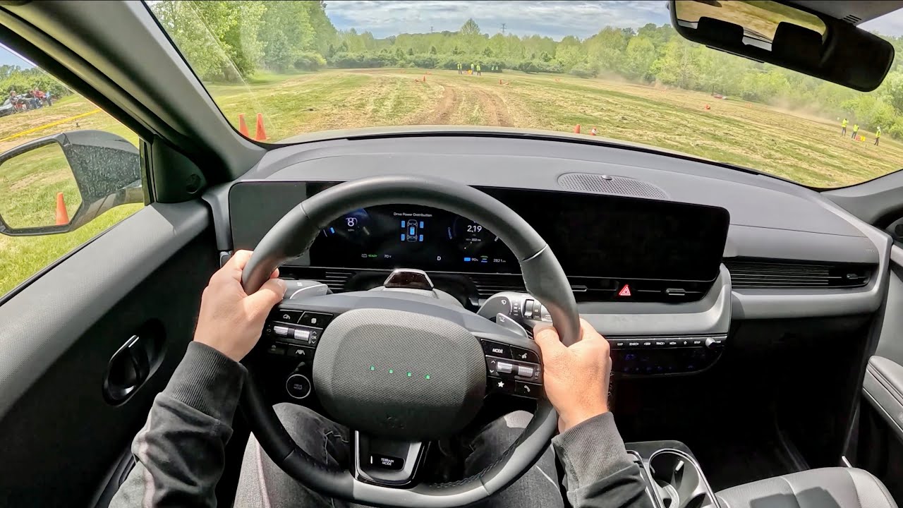 Hyundai Ioniq 5 XRT sliding sideways on a dirt rally cross course in Cincinnati Ohio
