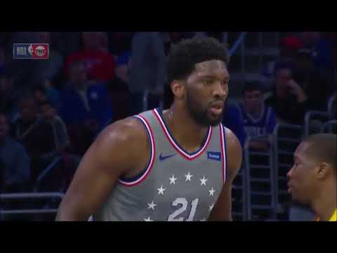 Embiid and Bledsoe whip the ball at each other leading to both teams getting involve in the skirmish
