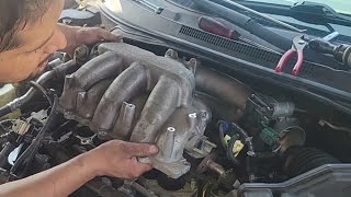 Nissan 3.5 V6 remove fuel injectors, intake manifold and camshaft position sensor locations.