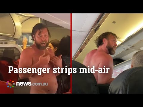 Drunk Russian passenger strips mid-air 'while trying to jump off the plane'