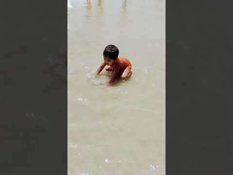 naughty Krishna playing sea ⛵ #reels #shortreels #kidsvideo #ytshorts #evening #kids #cutebaby
