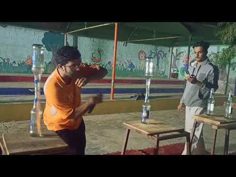 world record practice with nunchaku most playing card removed between two bottle cap in one minute