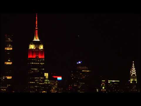 U.S.S. Discovery Soars Along NYC Skyline