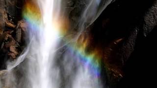 Yosemite cascading waterfalls with rainbows