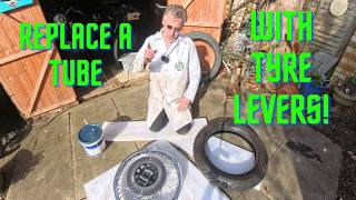 Changing a tubed tyre by hand