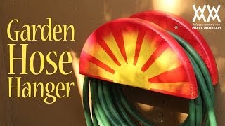 Garden hose hanger. Fun spring woodworking project for your home!