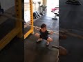 Scott's son, Grant, learns how to squat.