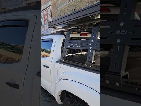 San Hima Hotham Rooftop Tent sitting on the RCI 18\" bed rack with the tonneau adapters. #rcioffroad