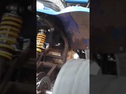 Straight piped 110cc Chinese ATV shoots flames