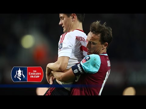 Mark Noble carries Ander Herrera off the pitch | Snapshots