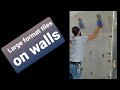 Installing 24"x48" porcelain tiles on walls
