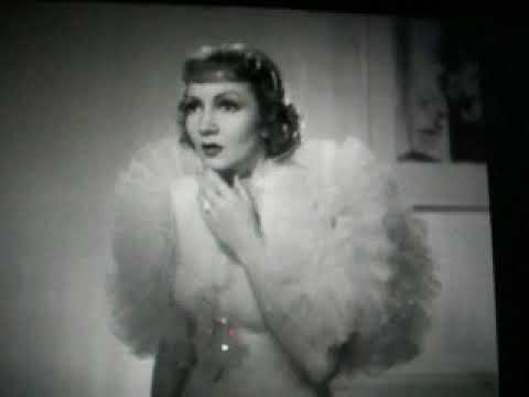 Gary Cooper spanks Claudette Colbert