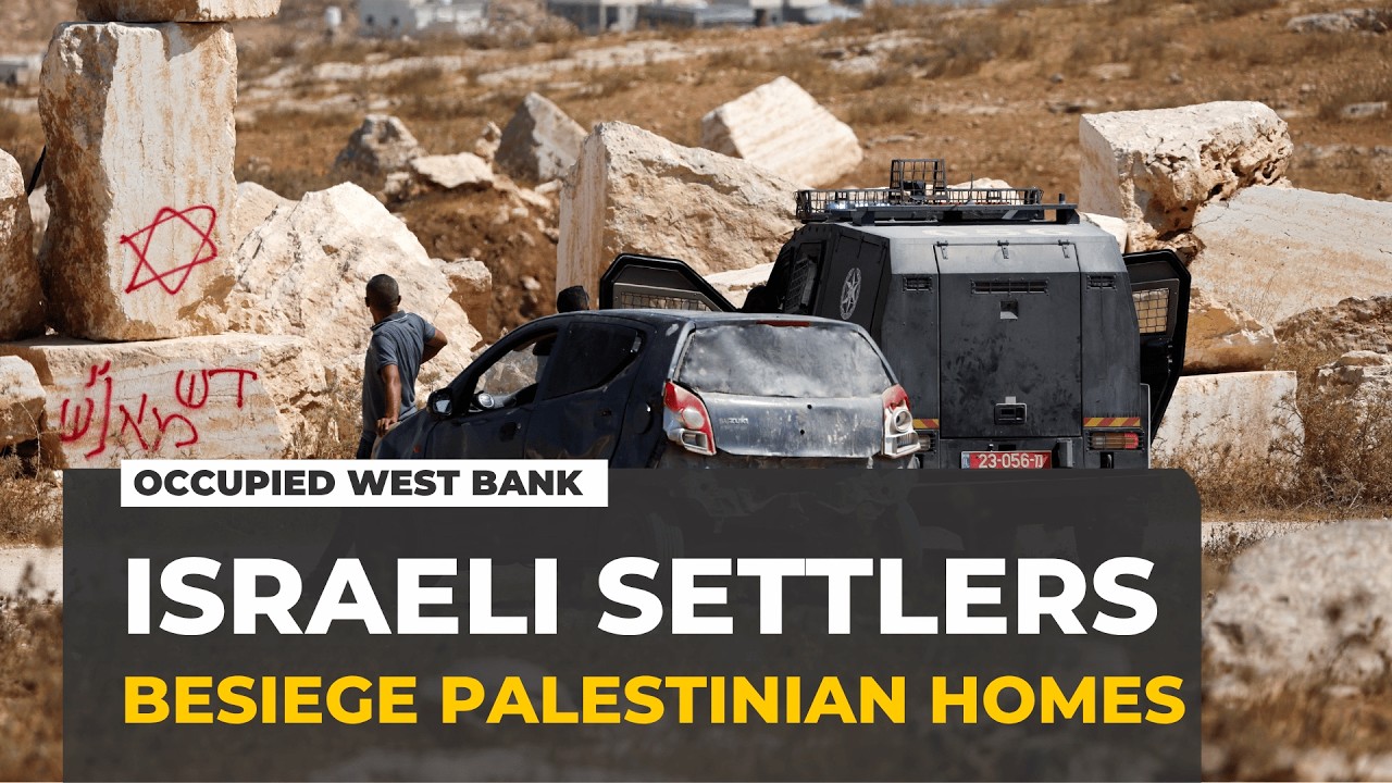 Israeli settlers besiege Palestinian homes in the occupied West Bank
