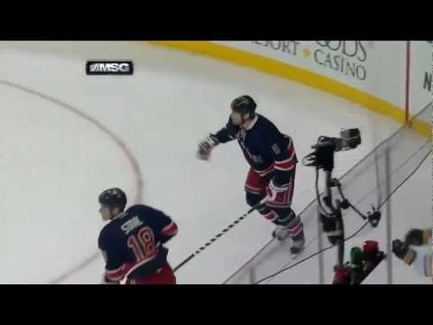 Dan Girardi boarding on Tyler Ennis . Mar 3, 2013