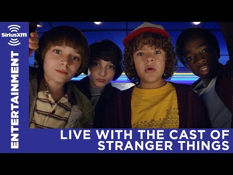 The cast of Stranger Things answering questions with SiriusXM's EW Radio