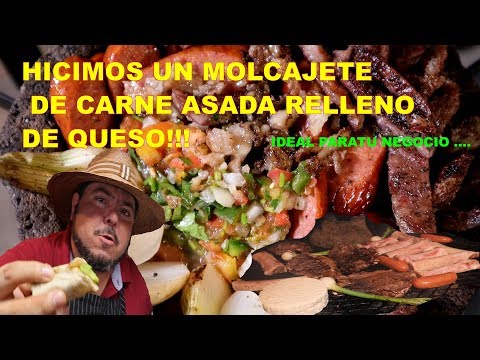 HICIMOS  UN MOLCAJETE RELLENO DE CARNE ASADA Y QUESO.