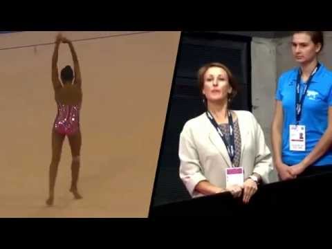 Zaripova watching Mamun's clubs routine 2015