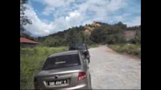 preview picture of video 'Fr. Thomas Madanan leading the Terawi Group on a Trip to the Tivung Cross, Penampang, 13 July 2014'