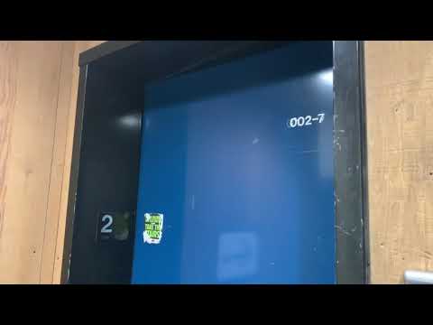 MontgomeryKONE (KONE mod) traction elevator @ SFU Academic Quadrangle (North side)