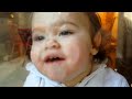 Cute baby girl washing windows - hilarious