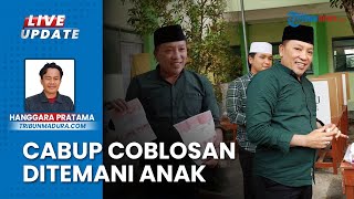 Cabup Sampang Slamet Junaidi Bareng Anak Dafa Dzikri Gunakan Hak Suara di TPS 009 Karang Dalam