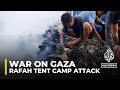 Palestinians search charred remains of Rafah tent camp