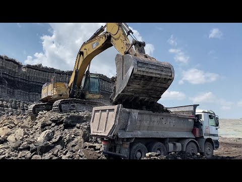 Caterpillar 365C Excavator Loading MAN And Mercedes Trucks - Operator Petros Kyrkos