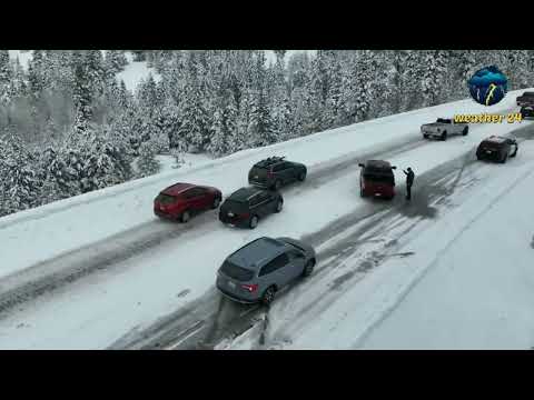 Snow piles high in the Sierra - Nevada Mountains. Donner Pass This is unbelievable