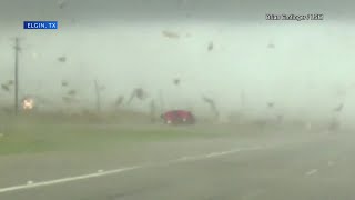 Driver keeps truckin&#39; after tornado flips his pickup