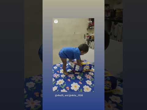 Vihaan Sharma  playing with diapers 