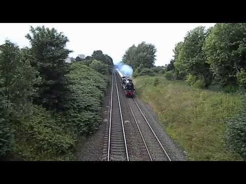 Steam locomotive hauled train passes through Y Fflint, Sir Y Fflint Cymru/Flintshire Wales on 4.8.13