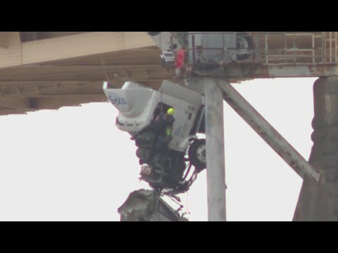 Trapped driver rescued from semi hanging over Louisville bridge | FULL RESCUE
