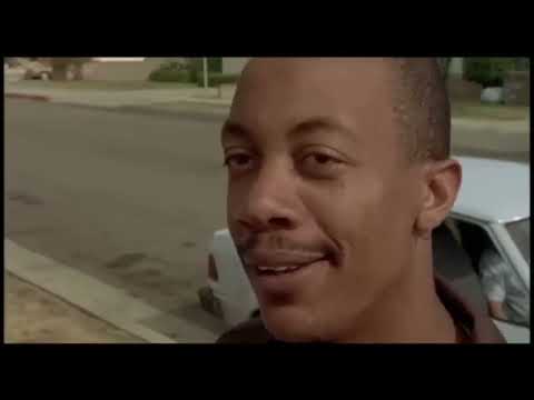 Friday trailer frame with Deebo presence and ominous mood