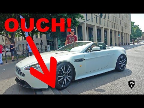 OUCH! Aston Martin V8 Vantage Volante Scratches Sidewalk!