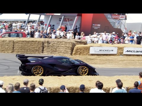 Supercars roaring up the Goodwood hill climb - Singer, Apollo IE, Vulcan AMR etc.
