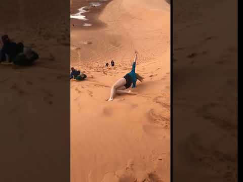 Sledding down the dunes