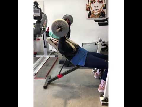 Kylie Grimes doing weight training