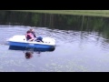 Steering a paddle boat on the lake