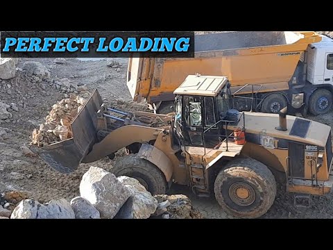 How caterpillar Wheel Loader Loading dump Truck, Training step by step.