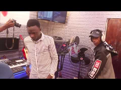 Fresh kid's Daddy in studio recording his first song